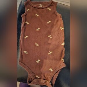 Carter's onesie that's brown with little dogs on them with no sleeves